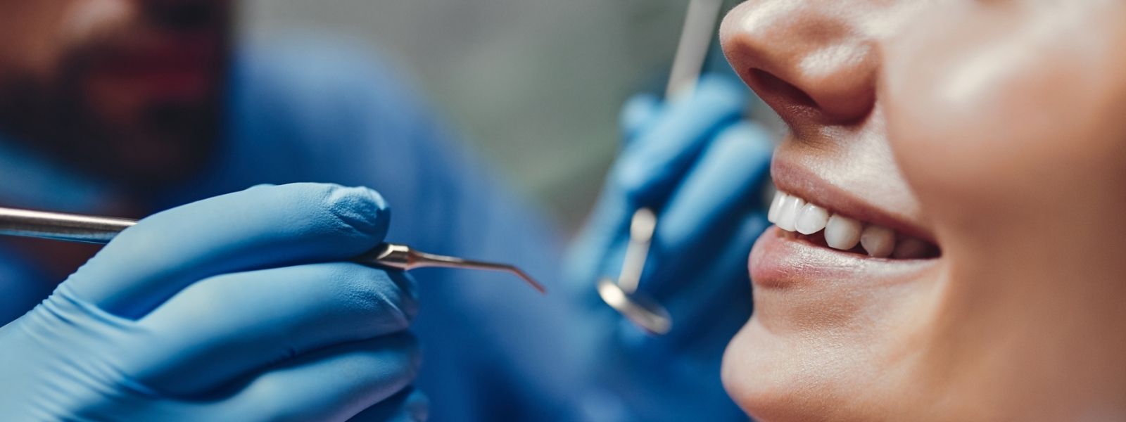 Dentist doing a dental implant.